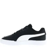 Championes urbanos Puma Caven, color negro con detalles en blanco, confeccionados en cuero sintético, con logo de Puma en los laterales y suela de goma.