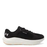 Championes Under Armour Versurge de diseño deportivo, color negro con entresuela blanca y suela de goma color caramelo. Presentan una combinación de malla y gamuza en la capellada, con cierre de cordones y logo de la marca en el lateral.