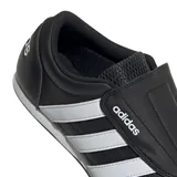 Championes Adidas modelo Tekwen, diseño sin cordones en color negro con las icónicas tres tiras blancas laterales y logo de la marca en el empeine y talón.
