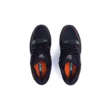 Championes de skate Öus modelo Cuoro, color marrón con detalles en negro. Presentan una estructura robusta con refuerzos en la puntera, cierre con cordones y una tira de velcro sobre el empeine. Incluyen el logo de la marca en el lateral y suela de goma con diseño texturizado.
