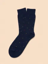 Medias de algodón color azul marino con estampado de pequeños puntos en tonos rojos y amarillos.