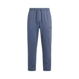 Pantalón deportivo Nike modelo Totality, color azul grisáceo, con cintura elástica ajustable mediante cordón y logo de la marca bordado en el lateral.