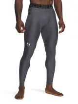 Calza deportiva Under Armour de compresión, color gris, con cintura elástica ancha con logo de la marca, bolsillo lateral y logo reflectante en la pierna.