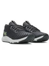 Championes de entrenamiento Under Armour Charged Engage 2, color negro con detalles en verde lima y suela blanca. Presentan parte superior transpirable con estampado 3D, refuerzos de TPU en el talón y entresuela Charged Cushioning para mayor amortiguación y respuesta.