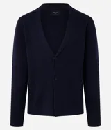 Blazer azul marino de algodón, con cuello de solapa, doble abotonadura frontal y mangas largas ajustadas.