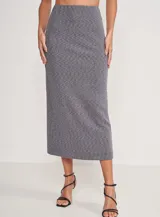 Falda midi gris de tejido de punto acanalado, corte recto y cintura alta.