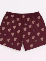 Bóxer de algodón blanco con estampado de flores pequeñas color celeste, con cintura elástica y logo de la marca en el centro.