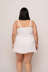 Babydoll blanco con corpiño de puntilla elastizada color celeste y breteles elásticos regulables.