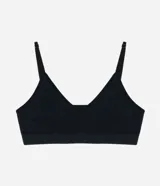 Soutien tipo top de diseño seamless, confeccionado en poliamida texturizada de color negro. Presenta base ancha, copas removibles y breteles finos regulables.