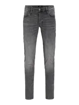 Jean gris oscuro de corte slim fit, con tiro bajo, rodilla ajustada y pierna ceñida. Diseño clásico de cinco bolsillos y cierre con botón.