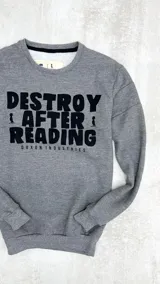 Buzo gris oscuro de algodón con felpa en el interior. Estampa negra en el pecho con la frase "Destroy After Reading" y el logo de Duxon Industries.