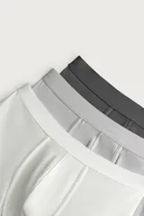 Pack de tres calzoncillos tipo bóxer de tejido elástico con acabado aterciopelado y cintura elástica.