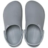 Zuecos Crocs modelo Classic Crafted Clog, de color beige, con parte superior de lona textil y suela de goma Croslite. Incluye correa de talón pivotante y detalles de la marca en el lateral.