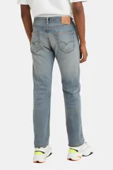 Jeans Levi's 501 Original Button Fly de corte recto, color celeste con lavado medio y cierre con botones.