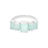 Anillo plateado con cinco piedras rectangulares color aguamarina.