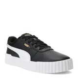 Championes Puma modelo Carina 3.0, de diseño urbano inspirado en los años 80. Presentan una capellada de cuero sintético en color negro con la icónica franja lateral Formstrip en blanco. Cuentan con una suela de plataforma blanca con textura acanalada y plantilla SoftFoam+ para mayor amortiguación.