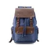 Mochila Lincoln's de tela canvas azul con detalles en cuero sintético marrón. Cuenta con cierre superior tipo marinero con cordón, solapa con broches magnéticos y correas ajustables. Incluye bolsillos laterales con cierre y compartimento interno para laptop.