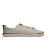 Zapatillas Reef color crema con detalles marrones, de lona con suela blanca.