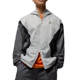 Campera rompevientos con capucha Nike Jordan, diseño color block en tonos gris claro, gris oscuro y negro. Presenta cierre frontal completo, bolsillos laterales y logo Jumpman bordado en el pecho.