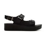 Sandalias negras con plataforma, tiras anchas con hebillas metálicas y ajuste trasero con hebilla.