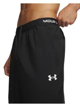 Pantalón deportivo Under Armour Vanish Training Pant, color negro, de corte relajado con puños elásticos en los tobillos y logo reflectante en el muslo.