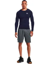 Remera de compresión Under Armour HeatGear de manga larga color azul marino con logo blanco en el pecho.