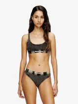 Bralette deportivo de suave algodón elástico con escote redondo, banda elástica inferior y estampado de pata de gallo con efecto desgastado tipo denim.
