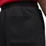 Pantalon de jogging Jordan modelo Brooklyn Fleece, color negro, con cintura elástica ajustable mediante cordón, puños acanalados en los tobillos y logo Jumpman bordado en contraste en la pierna izquierda.