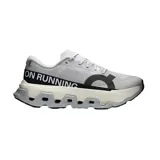 Championes de running On Running Cloudmonster 3 Hyper para hombre, color gris con suela gruesa con tecnología CloudTec y detalles en negro.