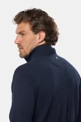 Campera de tejido fino confeccionada en algodón, con cierre frontal completo, cuello alto y puños acanalados.