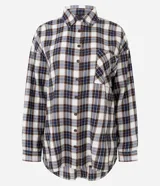Camisa de manga larga confeccionada en franela de viscosa, con estampado de cuadros, cuello clásico y bolsillo frontal. Presenta un corte regular con dobladillo redondeado.