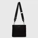 Bolso tipo tote mini de color amarillo, con diseño minimalista y correa ajustable con logo grabado. Cuenta con herrajes metálicos y etiqueta lateral distintiva.
