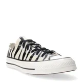 Championes Converse Chuck Taylor 70 Glow In The Dark con estampado animal print en blanco y negro, cordones negros y suela blanca con detalles en negro.