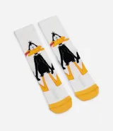 Medias de caña larga blancas con estampa del Pato Lucas, puntera y talón en color amarillo.