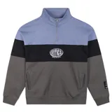 Buzo canguro con medio cierre de felpa cepillada, diseño de bloques de color en tonos celeste, negro y gris oscuro, con logo impreso en el pecho y calce oversize.