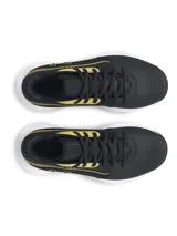 Championes de básquetbol Under Armour modelo Lockdown 7, con diseño en color negro y detalles en dorado. Presentan una estructura resistente con entresuela blanca y suela de goma negra, ideales para el rendimiento en cancha.