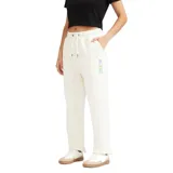 Pantalon tipo jogger color beige, con cintura elástica ajustable mediante cordón y corte holgado.