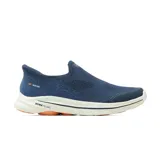 Championes deportivos Skechers modelo Go Walk 8, sin cordones, con parte superior de tejido knit elástico en color azul. Presentan suela con tecnología Ultra Pillars y amortiguación Ultra Go para mayor retorno de energía.