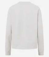 Blusa básica de manga larga con cuello redondo y puños ajustados, confeccionada en tejido de algodón y poliéster. Presenta un corte regular anatómico y diseño liso sin estampas.