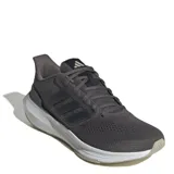 Championes de running Adidas modelo Ultrabounce, color gris oscuro con detalles en gris claro. Presentan un diseño de malla transpirable, mediasuela con tecnología Bounce para mayor amortiguación y suela de caucho resistente.