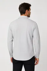 Buzo negro de cuello redondo con el texto "MAN EDITION" estampado en el pecho, de manga larga con puños elastizados y diseño liso.