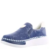 Zapatos tipo slip-on Bottero de color azul con efecto desgastado, suela de plataforma blanca con detalle de costura decorativa y elásticos laterales para mayor comodidad.