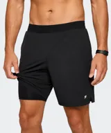 Short de entrenamiento Fabletics modelo The Fundamental II, color gris con calza interna negra ajustada. Cuenta con cintura elástica ancha y pequeño logo reflectante en el lateral.