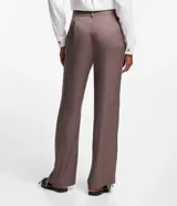 Pantalón recto de jacquard con estampado mini pied-de-poule, trabillas en la cintura y bolsillos tipo cuchillo.