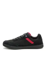 Zapatillas Caterpillar modelo Pause Retro Leather, color negro con detalles en fucsia y cordones bicolor. Confeccionadas con capellada de cuero y lona, forro de malla de nailon y suela de goma.