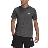 Remera deportiva Adidas de hombre, color gris jaspeado, con logo blanco en el pecho. Confeccionada con tejido transpirable Aeroready y diseño FreeLift.