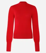 Suéter negro de punto con cuello alto, mangas largas abullonadas y puños largos.