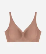 Soutien top Lov confeccionado en microfibra color tostado, de diseño sin costuras, con escote en V profundo, base alargada, breteles anchos y copas removibles.