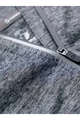 Buzo deportivo Topper de mujer en color gris melange, con cuello alto, cierre frontal parcial de medio cuarto y mangas largas con detalles reflectantes.