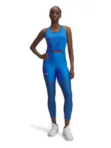 Calza deportiva Under Armour de tiro alto, confeccionada en tejido elástico con tecnología de secado rápido. Presenta un diseño bicolor en tonos azules, combinando una parte superior lisa con paneles inferiores estampados con textura sutil. Incluye bolsillo lateral y logo de la marca en el muslo derecho.